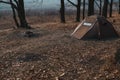 View of a tourist tent with a quick-build system, brown. no people. place for text. Dull dark tones of autumn morning, winter Royalty Free Stock Photo