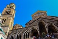 View of tourists on the streets of Amalfi, who stop to admire the cathedral Royalty Free Stock Photo