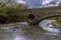 A view toward the bridge over the river Teifi at Cenarth, Wales after heavy rainfall