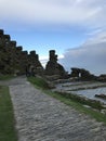 A view towards the keep of Robert, Duke of Cornwall`s 13th Century castle on Tintagel, UK