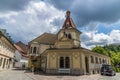 A view towards a church on the leftt bank of the Ljubljanica River in Ljubljana Royalty Free Stock Photo