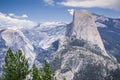 View towards Half Dome, snow capped mountains in the background, Yosemite National Park, California Royalty Free Stock Photo