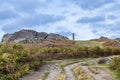 A view towards Precambrian rock outcrops and the war memorial in Bradgate Park, Leicestershire, UK