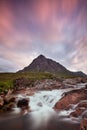 View towards Rannoch Moor, River Coupall in foreground, Beinn a` Chrulaiste on left. Highland, Scotland, UK. The mountain is Buach Royalty Free Stock Photo