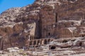 A view towards Royal Tombs carved into the hillside in the ancient city of Petra, Jordan Royalty Free Stock Photo