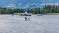 A view towards Stanley Park of a floatplane taking off in Vancouver, Canada Royalty Free Stock Photo