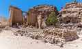 A view towards the temple ruins and rock caves in the ancient city of Petra, Jordan Royalty Free Stock Photo