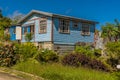 A view towards typical Chattel houses on the Atlantic coast of Barbados Royalty Free Stock Photo