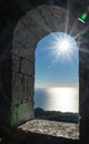 View from the tower on Akhun mountain. Sun rays over the Black Sea and bright blue sky. Sochi, Russia Royalty Free Stock Photo