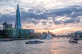 View from Tower Bridge against Thames river with tourist boat in London, England, UK Royalty Free Stock Photo