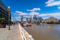 View of Tower Bridge in London, England, UK with a skyline view in the background