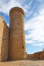 View of the tower of the castle of Tossa de Mar in Catalonia Spain with sky with clouds in the background in October 2021