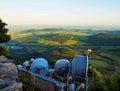 View from tower of meteorological observatory with many parabolic satellites to morning countryside. Spring morning Royalty Free Stock Photo