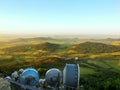 View from tower of meteorological observatory with many parabolic satellites to morning countryside. Spring morning