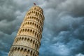 View of the tower of Pisa from below and dramatic cloud sky Royalty Free Stock Photo