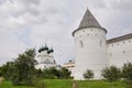 View of the tower of the Rostov Kremlin, the Church of Gregory the theologian and the Metropolitan garden on a summer
