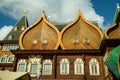 View of the tower and turrets of the Kolomna Palace of Tsar Alexei Mikhailovich made of wood on a clear sunny day.