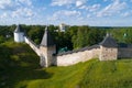 View of the towers of the Holy Dormition Pskov-Caves Monastery aerial survey. Pechory, Russia Royalty Free Stock Photo