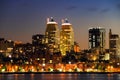 View of the towers, skyscrapers and buildings in Dnipro city at night, lights reflected on the river Dnieper, Ukraine. Dnipro, Royalty Free Stock Photo