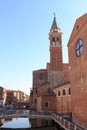 View of town Chioggia with canal Vena and church steeple of Chiesa della Santissima Trinita in Veneto, Italy Royalty Free Stock Photo