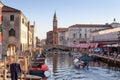 View of town Chioggia with canal Vena and church steeple of Chiesa della Santissima Trinita in Veneto, Italy Royalty Free Stock Photo