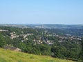 View of the town of halifax from high west yorkshire countryside surrounded by trees fields and nearby villages