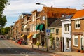 View on the Town hall and beautiful buildings on the central square during the sunny morning in Delft city, Netherland Royalty Free Stock Photo