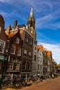 View on the Town hall and beautiful buildings on the central square during the sunny morning in Delft city, Netherland Royalty Free Stock Photo