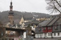 View of the town hall and the bridge over the Moselle River from the embankment in the city of Cochem, Rhineland