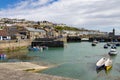 View of the town and harbour in Porthleven, Cornwall on May 11, 2021. Unidentified people Royalty Free Stock Photo