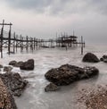 view of the Trabocco Cungarelle pile dwelling on an overcast an rainy day on the Costa dei Trabocchi in Italy Royalty Free Stock Photo