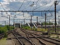 View on the tracks and a train leaving the station