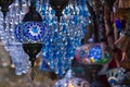 View of traditional bright decorative hanging Turkish lamps and colourful lights with vivid colours in the Grand Bazaar. Istanbul