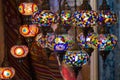 View of traditional bright decorative hanging Turkish lamps and colourful lights with vivid colours in the Grand Bazaar. Istanbul Royalty Free Stock Photo