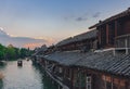 Traditional Chinese houses by water with boats, in the old town of Wuzhen, China Royalty Free Stock Photo