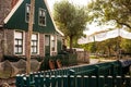 View on traditional Dutch houses and streets in a recreated heritage museum with beautiful historic vintage scenes from Holland.