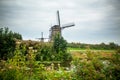 Dutch Windmill and landscape seen from Kinderdijk Netherlands Royalty Free Stock Photo