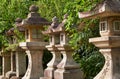 A kaku-doro square stone lanterns along the pass at Kitano Tenmangu shrine. Kyoto. Japan