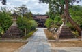 A kaku-doro  square stone lanterns along the pass at Kitano Tenmangu shrine. Kyoto. Japan Royalty Free Stock Photo