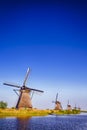 View of Traditional Romantic Dutch Windmills in Kinderdijk Village Royalty Free Stock Photo