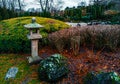 View of a traditional stone lantern ishi-doro by in a Japanese garden in Bonn, Germany .