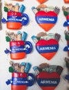 View of traditional tourist souvenirs, presents and gifts from Armenia, fridge magnets with text