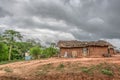 View of traditional village, house thatched with roof and terracotta walls