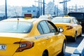 View of a traditional yellow Turkish taxi in the streets of istanbul city.