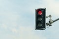 View of a traffic light and a traffic camera that captures the passage of a red traffic light. Royalty Free Stock Photo