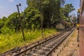 A view from a train approaching the station at Yatiwaldeniya on the Kandy to Colombo main line railway in Sri Lanka, Asia Royalty Free Stock Photo