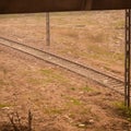 View of train Railway Tracks from the middle during daytime at Kathgodam railway station in India, Train railway track view,