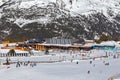 View of the training slope and the building of the ski school in the ski resort in the Pyrenees, Andorra Royalty Free Stock Photo