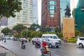 View of Tran Hung Dao statue with many cars and bike in the foreground in Ho Chi Minh City, Vietnam Royalty Free Stock Photo