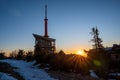 view of transmitter with cottages on lyse mountain at sunrise, czech beskydy lysa hora